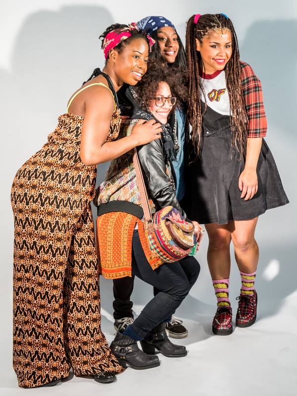 Photo of four women posing 