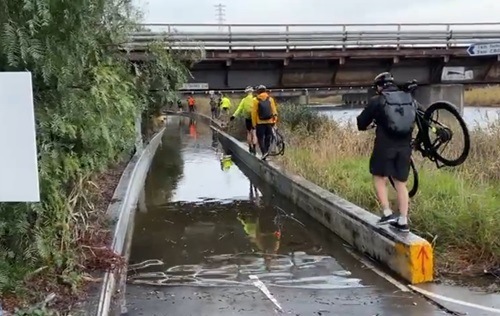 'We present to you, the only bike path from The West to the CBD. But it doesn't have to be this way, there's a new SUP bridge linking Dynon Rd to West Melbourne. 'Rainbow Bridge' has been finished for months, but remains unopened.' Screenshot: BikeVic West on x/twitter, 12 June 2024