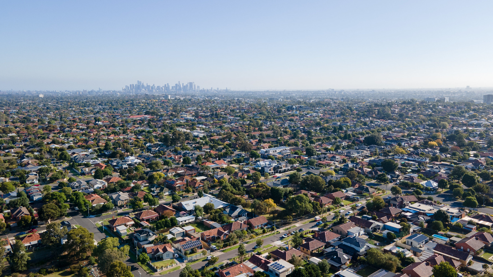 Aerial photograph of northern suburbs of Melbourne looking towards the CBD from Preston.