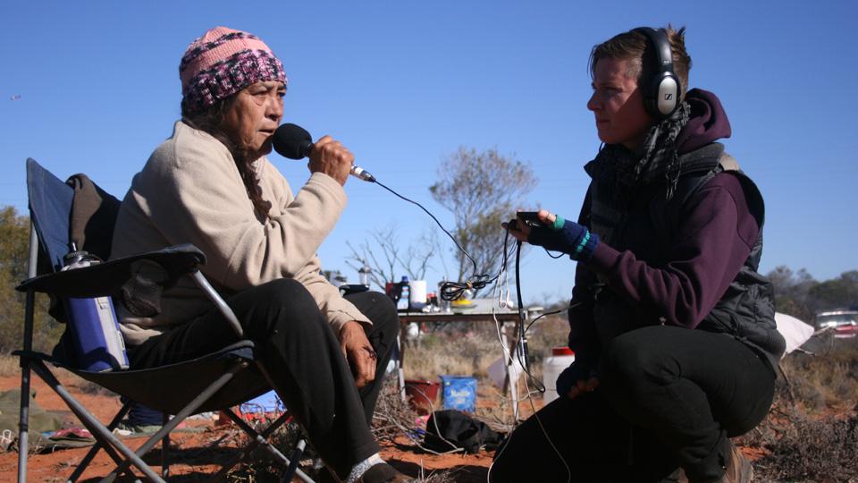 The Radioactive Show's Jessie Boylan interviews Sue Hasseldine at Lizards Revenge festival and protest, Roxby Downs, 2012. Photo by Gem Romuld.