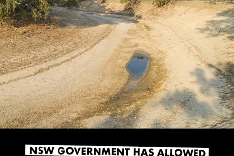 Image shows a dry river bed with the text "Let the rain flow into our rivers"