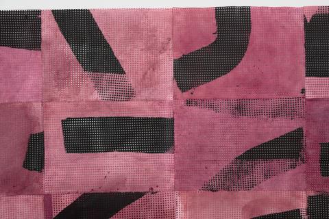 Pink and black abstracted text detail from work of artist Julia Boros