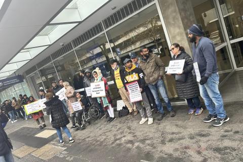 Protesters holding signs outside the Dept of Home Affairs in Docklands, organised by and photo credit from Refugee Women Action for Visa Equality (https://www.facebook.com/RefugeeWAVE/)