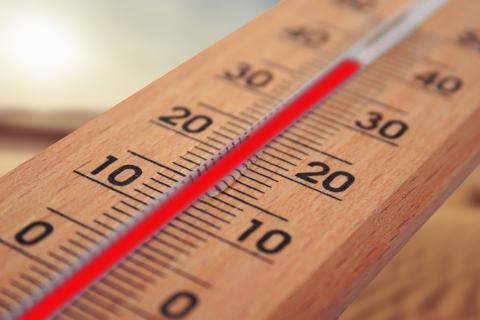 Mercury thermometer showing temperature reaching near 40 degrees celsius.