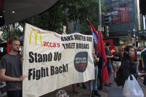 Workers protest out the front of a MacDonalds store in Brisbane