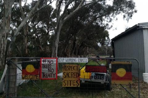 Gate at front of Djabwurrung embassy, covered in protest signs