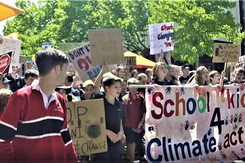 Student Stikers with joy march with placards and banners