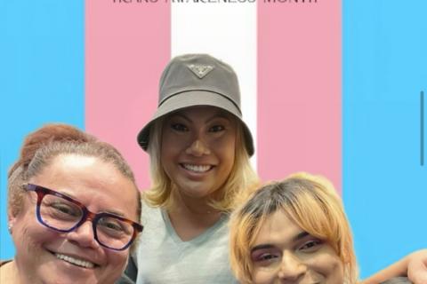 Three trans women of different ages smiling. Behind this is a Trans Flag with the words the 3 Generations of Trans Immigrants