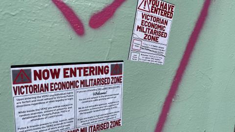 Stickers pasted up around the designated Police Special Powers Zone in Docklands this week at the site of the 2024 Land Forces Expo.